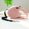 Laisse rétractable rose pour chien avec poignée ergonomique et ruban en nylon robuste - Style de base / Rose