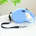 Light blue retractable dog leash with ergonomic handle and black nylon lead strap - Basic Style / Blue