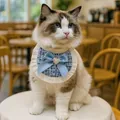 Blue tweed pet bandana with white pleated edges and a crystal heart bow on a cat - Blue Tweed Style Bib