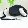 Laisse rétractable noire pour chien avec poignée ergonomique et sangle en nylon - Style de base / Noir
