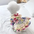Floral pet dress for small dogs with pink lace trim and a fuchsia bow on the back - Monet Garden Dress