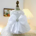 Elegant white pet wedding dress for small dogs with pearl necklace and large back bow detail - XS / Princess Consort Wedding Dress