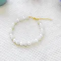 Elegant white beaded pet bracelet with gold clasp and adjustable extension chain - Pearl Bayberry Ball Necklace