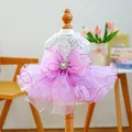 Macro detail of dog princess dress with sequins and a large purple mesh bow on wooden model - XS / Dreamy Fairy Wedding Dress - Purple