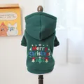 Detail of green pet hoodie featuring Merry Christmas embroidery and festive bell patterns - Dark Green Christmas Tree Embroidery
