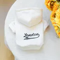 Off-white pet hoodie with London print and functional hood for dogs and cats - XS / London Print / Off White