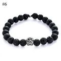 Detail of 8mm black lava stone beads with a vintage silver pet paw charm on an elastic bracelet - Black Lava Stone Style(#6)