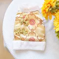 Detailed view of Chinese New Year pet vest with gold satin, embroidery, and faux fur trim - XS / Gold