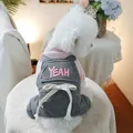 Detailed view of pink YEAH embroidery and white bow on pet winter jumpsuit - XS-Chest 30 Length 20 / Pink And Gray Patchwork - YEAH Style