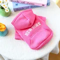 Detailed view of pink dog hoodie with New York embroidery and a functional back pocket - Rose Red