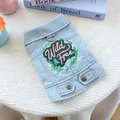 Detail of light blue denim dog vest with Wild & Free embroidery and metal D-ring for leash - XS / Wild Denim Jacket