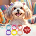 Close-up of 40pcs colorful elastic pet hair bows in assorted vibrant wavy textures - 40-piece Petal-shaped Hair Tie