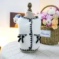 White faux fur pet vest with black trim and elegant velvet bows for small dogs - XS / Fragrance Style Vest