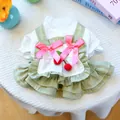 Detail of pet dress with cherry accents, pink bows and green pleated hem on waffle fabric - XS / Cherry Cake Skirt