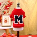 Detail of red festive pet sweatshirt featuring white lace collar and navy M patch - XS / Letter M Sweatshirt / Red