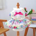 Detail of floral pet dress featuring layered pleats, lace trim, and a pink satin bow - XS (Chest 30cm Length 20cm) / Monet Garden Dress