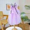 Detail of purple pet wedding veil with mesh bow, faux gemstone, and black ribbon accent - Purple Mesh Heart Jewel Style
