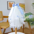 Close-up of white lace pet wedding veil with light blue ribbon bows and wavy edges - Light Blue Satin Bow Style