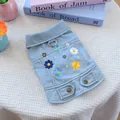 Cute light blue daisy denim dog vest with floral embroidery and a metal D-ring for leash - Sunshine Daisy Denim Jacket
