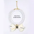 Détail du collier de perles avec nœud camélia et chaîne réglable en métal doré - Style Perle Nœud Camélia-Blanc