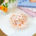 Pink floral pet bandana with orange flowers and white lace trim for small dogs - Calendula Bonnet Hat