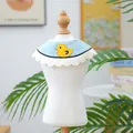 Detail of blue pet bandana with yellow duck patch and wavy white lace border - Blue Little Duck Bib