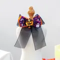 Detail of Halloween pet bow tie with orange mesh, purple ghost ribbon and small golden pumpkin bell - Pumpkin Style