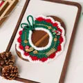 Detailed macro view of festive red and green knitted pet collar with gold bells and candy charms - Christmas Gold Label Yarn Collar White Faux Fur