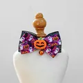 Detail of Halloween pet bow tie with ghost pumpkin patterns and a small orange bell - Halloween Pumpkin Bow Collar