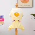 Cute yellow pet jumpsuit with duck embroidery and heart detail on a wooden hanger - Heart Chicken Suspender Pants