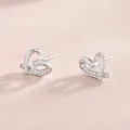 S925 sterling silver hollow heart earrings with crystals in polished silver finish - Silver-White