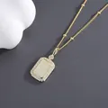 Golden rectangular A-letter pendant necklace with shimmering crystals on a fine beaded chain - Letter A Necklace