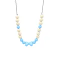 Detail of baby teething necklace with sky blue silicone beads and natural wooden rings - Blue
