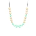 Close-up of silicone bow pendant and wooden beads on baby teething necklace - Green