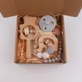Five-piece baby gift set with wooden bear rattle, elephant teether, and pacifier clip - Elephant Style