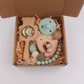 Five-piece wooden baby rattle and silicone pacifier clip gift set in a natural wood box - Bird Style