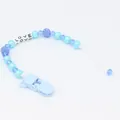Dettaglio catenella portaciuccio blu con lettere LOVE e perle stile cristallo - Blu