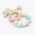 Detail of wooden unicorn teething ring and food-grade silicone beads for babies - Seahorse