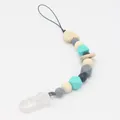 Dettaglio catenella portaciuccio neonato con perle in silicone e perla di legno a cuore - Trasparente