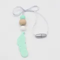 Macro detail of mint feather silicone pendant with natural beech wood and safety beads - Feather Dreamcatcher / Green