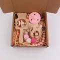 5-piece baby gift set with pink silicone pacifier and wooden bear rattles in a box - Rabbit Style