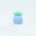 Detailed view of baby pineapple silicone teether with textured geometric pattern and soft colors - Blue