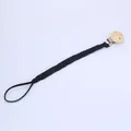 Attache-tétine tressée noire pour bébé avec support rond en bois de couleur beige - Noir