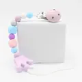 Detail of baby silicone pacifier clip with macaron beads and purple crown teether - Purple