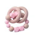 Natural beech wood and pink silicone baby teether ring set on a clean white background - Pink