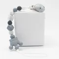 Baby silicone pacifier clip with grey crown teether and marble beads on white background - Gray