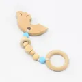 Détail du jouet de dentition pour bébé avec arc-en-ciel en hêtre et perles en silicone - Style arc-en-ciel