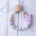 Silicone pacifier clip with purple crown, wooden beads, and BABY letter charms - Purple