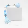 Blue silicone baby pacifier clip with round and hexagonal beads and crown pendant - Blue