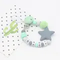 Mint green and grey silicone pacifier clip with star pendant and BABY letter beads - Light Green